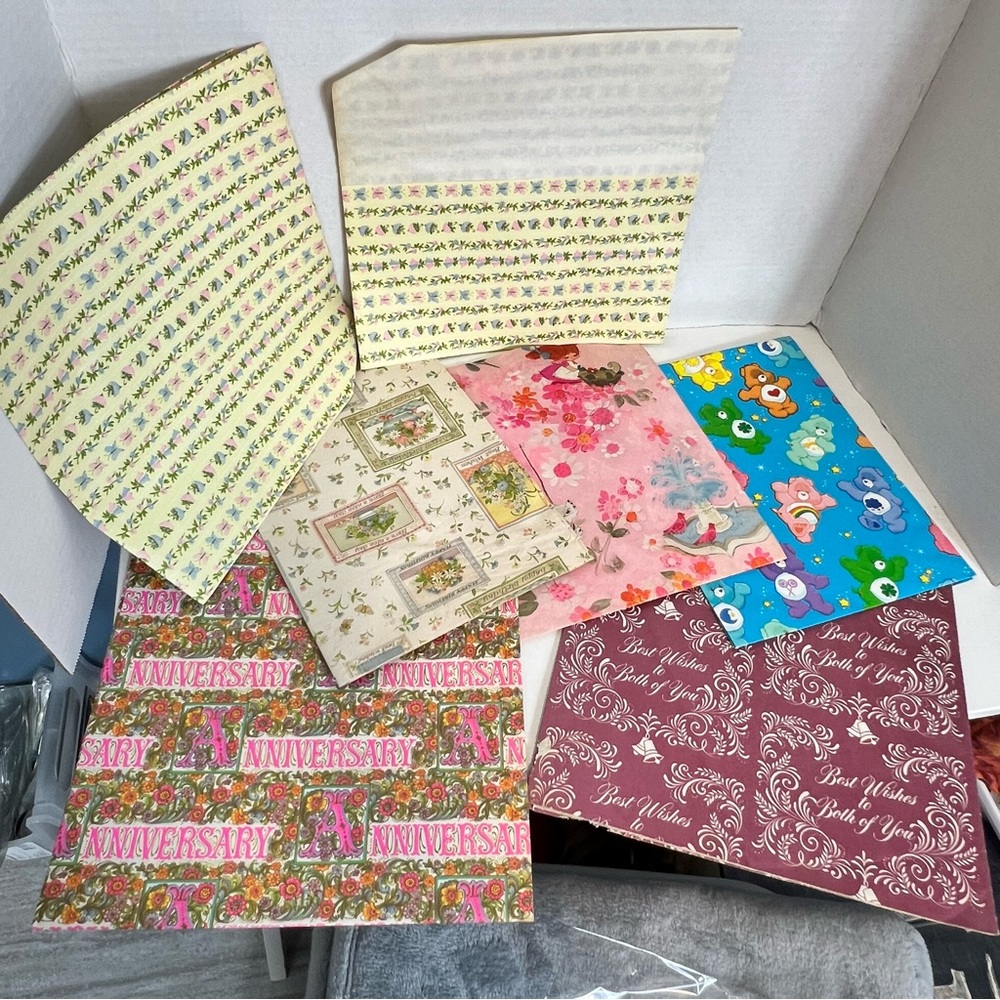 Vintage wrapping paper sheets, seven sheets some cut some whole